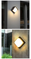 Two wall-mounted outdoor lights on a building exterior.