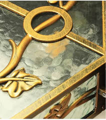 Decorative glass panel with gold leaf and geometric design