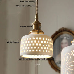 White ceramic pendant light with gold canopy and adjustable wire, labeled dimensions and features.