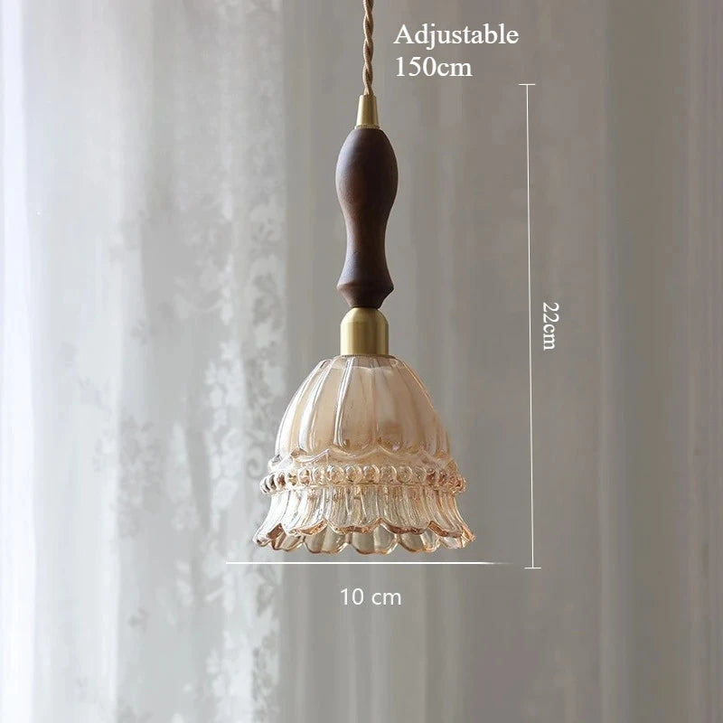 Pendant light with wooden handle and glass shade, shown with measurements against a neutral background.