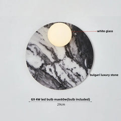 Marble-patterned light fixture with white glass cover on a gray background