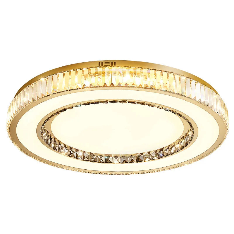 Gold circular ceiling light fixture on a white background