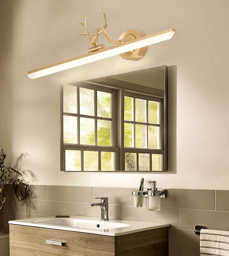Bathroom vanity with mirror, light fixture, and sink.
