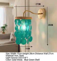 Gold Sconce with Tiered Capiz Shells and Wave Arm