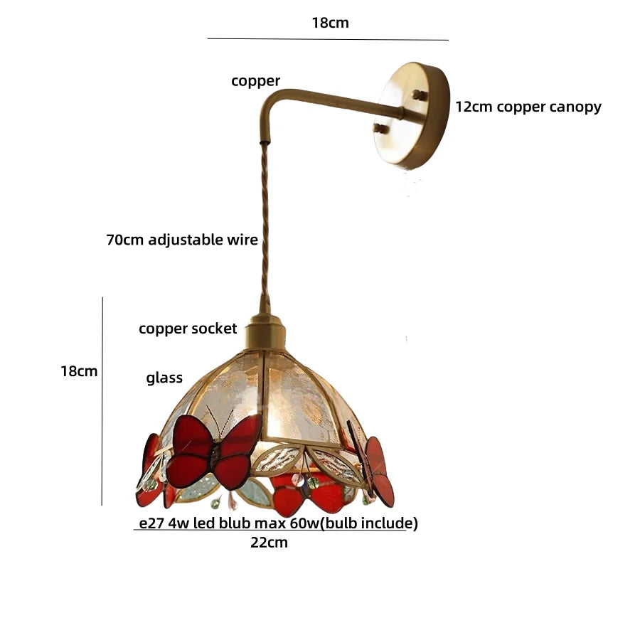 Decorative pendant light with measurements on a white background