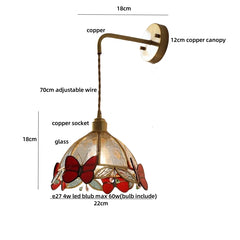 Decorative pendant light with measurements on a white background