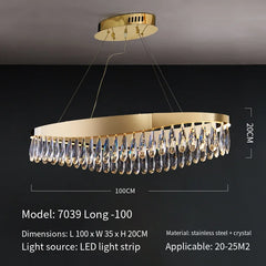 Gold chandelier with crystal accents on a dark background