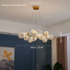 Chandelier with dimensions indicated on a blurred indoor background