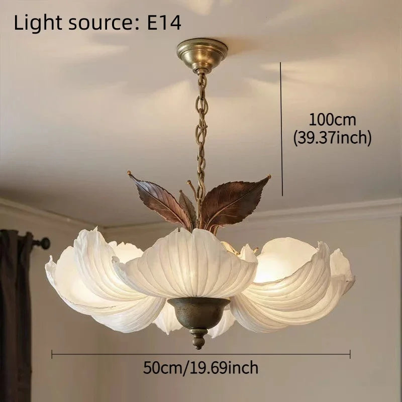 Chandelier with leaf design and measurements on a ceiling