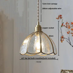 Pendant light with measurements and details on a neutral background