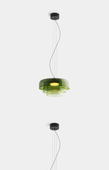 Green pendant light fixture on a white background