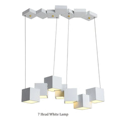 Modern white pendant lamp with seven square shades on a white background