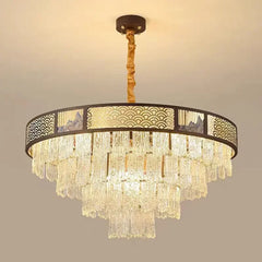 Close-up of a tiered crystal chandelier, showing the arrangement of clear crystal elements and the dark frame.
