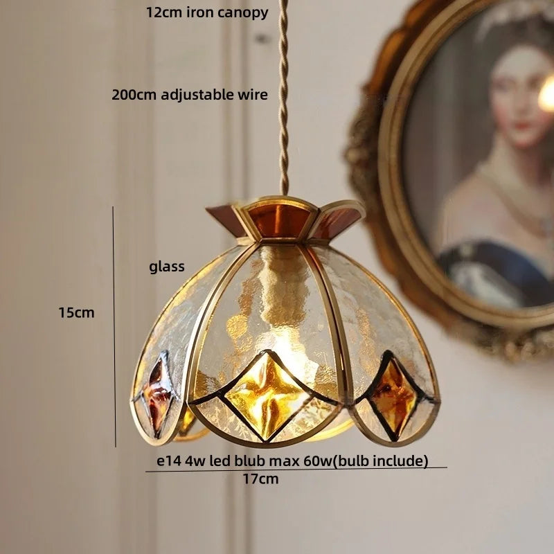Decorative pendant light with measurements and bulb information on a neutral background