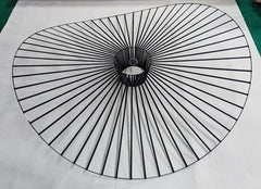 Circular metal grid on a white background