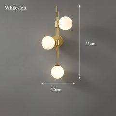 Modern Gold Brass Sconce with Three Frosted Globe Shades