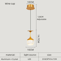 Gold pendant light with dimensions and material details on a white background