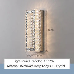 Wall-mounted light fixture with crystal design on a gray background