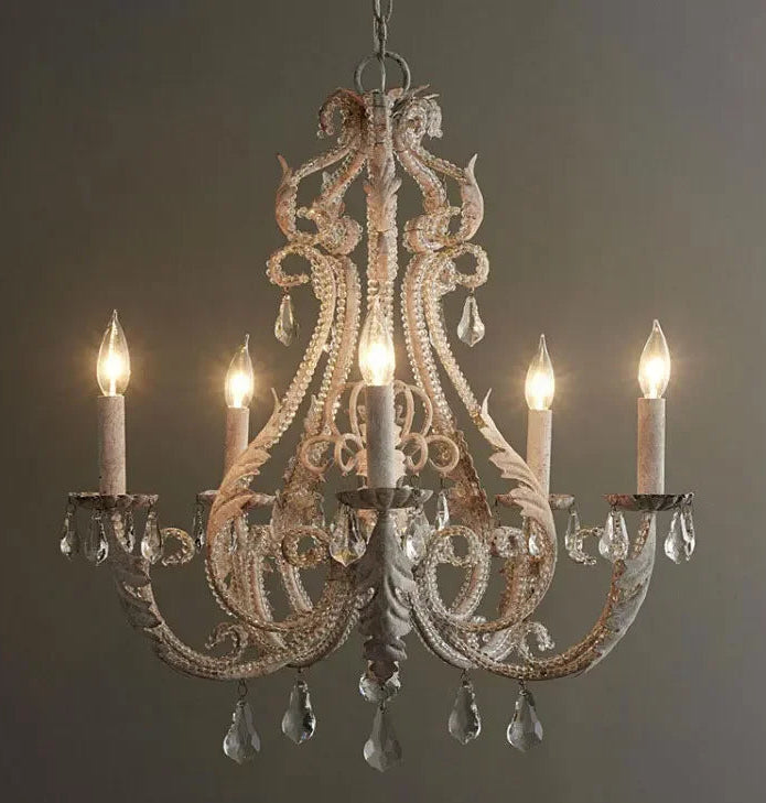 Decorative chandelier with five lights on a dark background