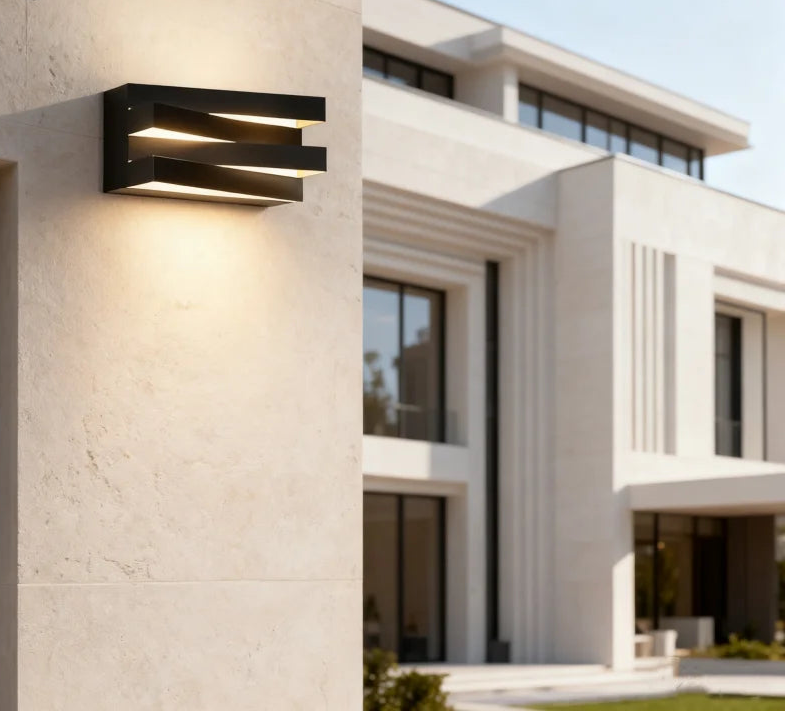 Modern outdoor wall light fixture on a building exterior.