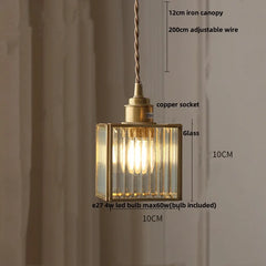 Pendant light with measurements on a plain background