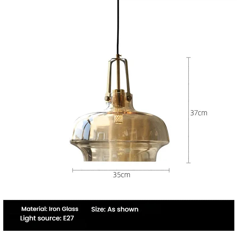 Gold pendant light with dimensions on a white background
