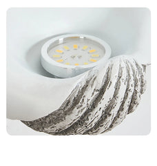 Light fixture with marble base on a white background