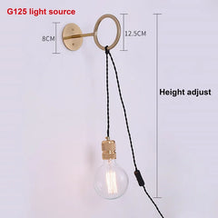 Wall-mounted light fixture with adjustable height and G125 light source on a white background