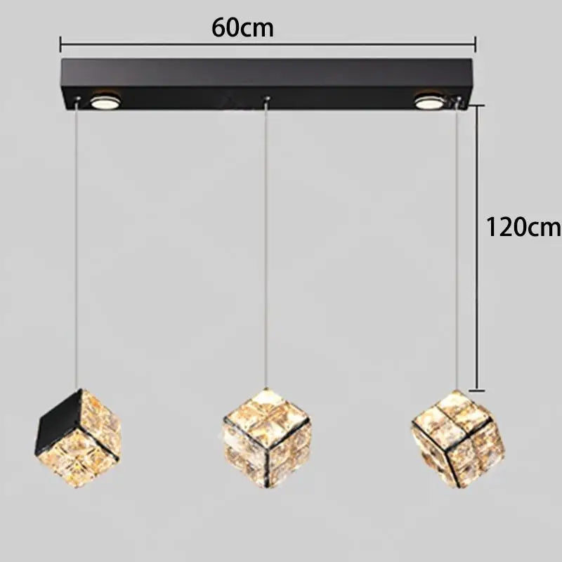 Modern pendant light fixture with crystal shades and dimensions indicated on a gray background