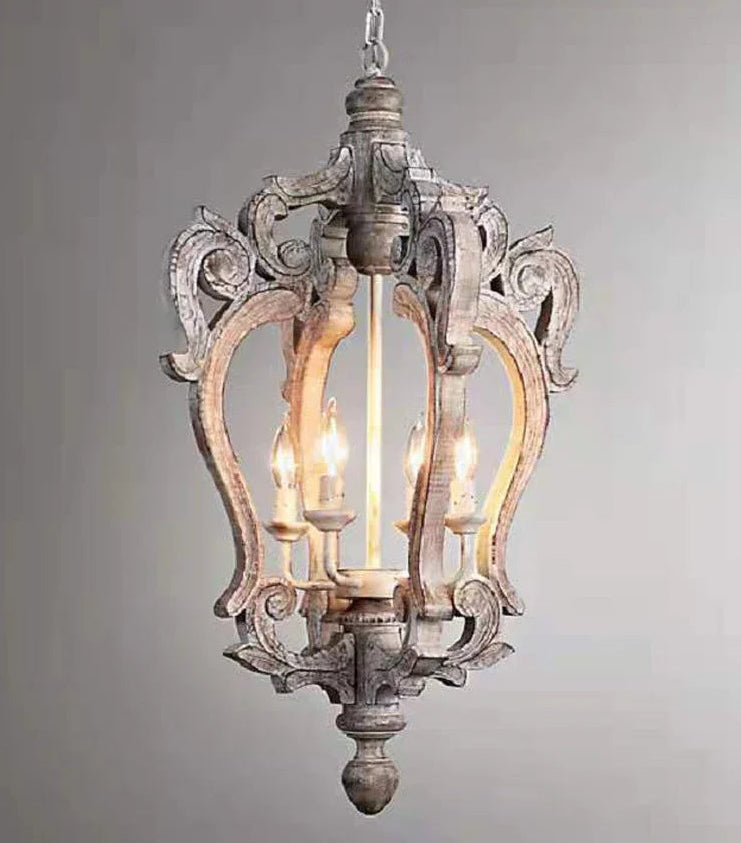 Decorative pendant light with intricate design on a gray background