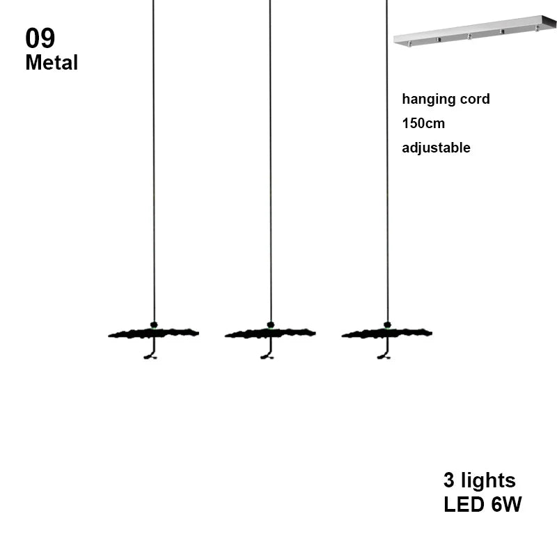 Diagram of a metal pendant light with hanging cord, adjustable length, and three LED lights.