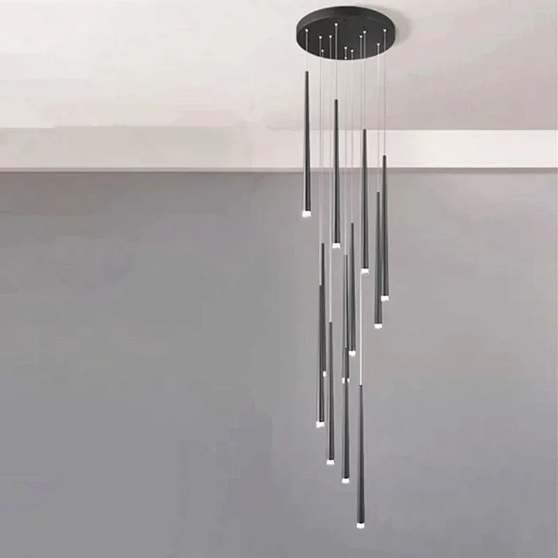 Modern chandelier with cylindrical lights on a plain background