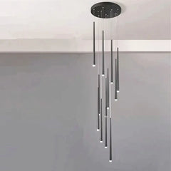 Modern chandelier with cylindrical lights on a plain background