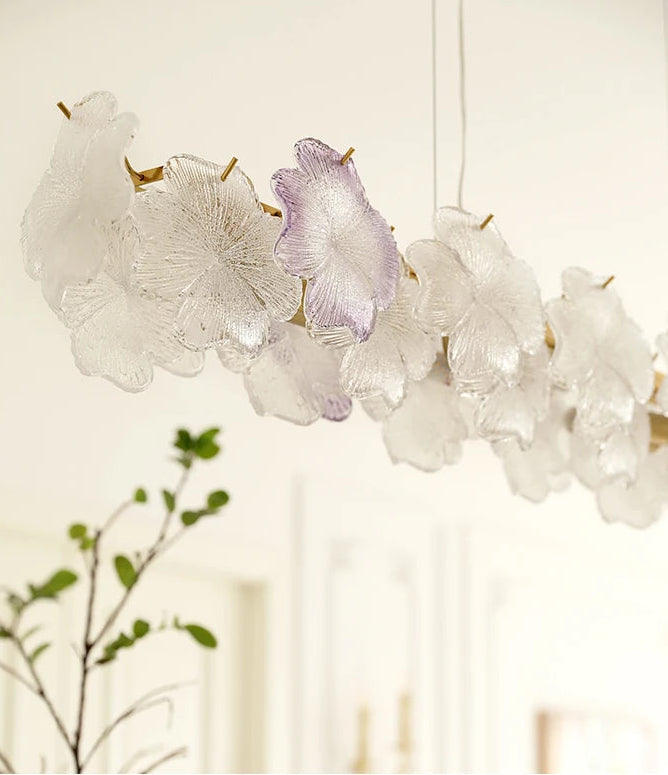 Decorative chandelier with floral design on a neutral background