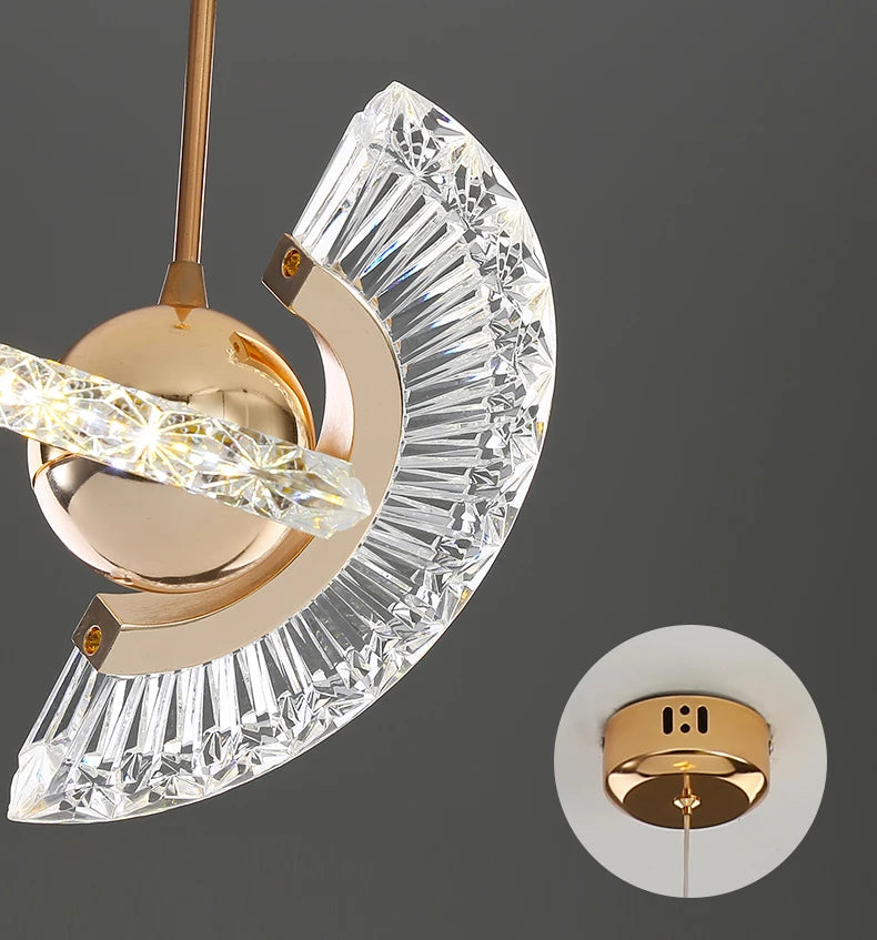 Decorative ceiling light fixture with crystal design on a dark background
