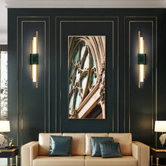 Decorative indoor wall sconce with two light sources for bedroom accent lighting