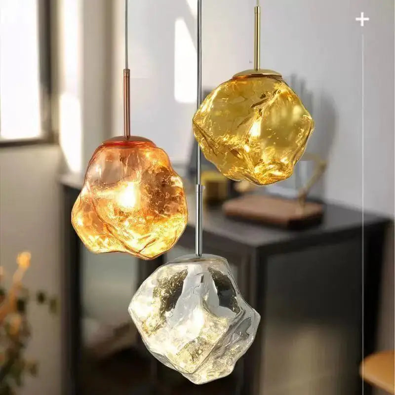 Adjustable metal chain suspending the modern lava glass pendant light