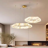 Three-ring marble pendant chandelier hanging in a modern living room