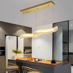 Dimmable hanging lamp in gold finish, perfect for contemporary home interiors