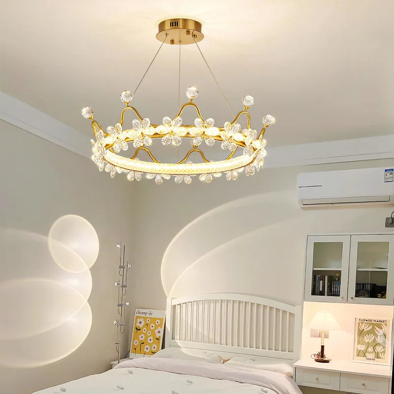 Modern ceiling chandelier featuring crystal accents and ring-shaped glow
