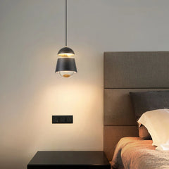 Modern cord pendant lamp with a compact shade for bedroom lighting