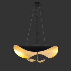 “Creative black gold UFO pendant light for modern interiors”