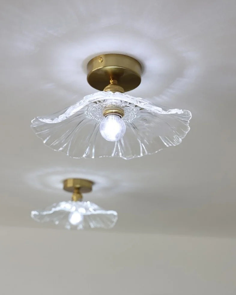 “Artisan lotus petal copper and glass ceiling lamp for tranquil interiors”