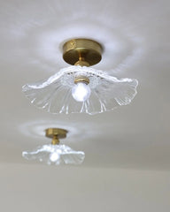 “Artisan lotus petal copper and glass ceiling lamp for tranquil interiors”