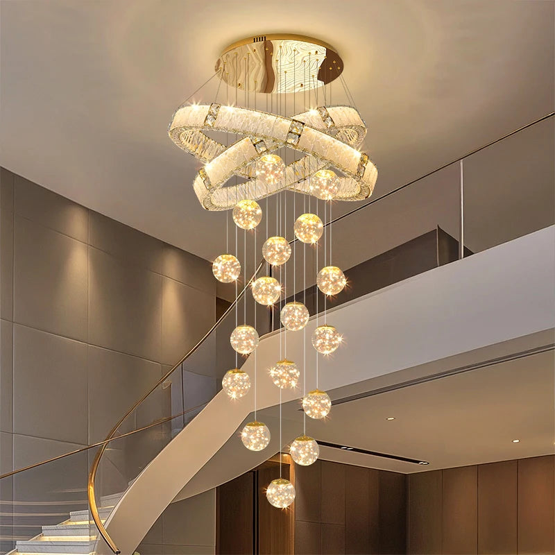 Brushed stainless chandelier with cascading K9 crystal spheres