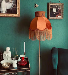 “Handmade retro floor lamp with polished chrome and velvet shade”