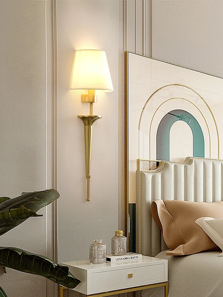 Decorative wall mirror with abstract design in a stylish room setting.
