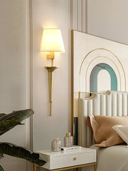 Decorative wall mirror with abstract design in a stylish room setting.