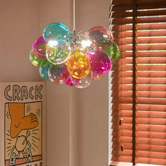 Colorful glass bubble chandelier mounted close to the ceiling