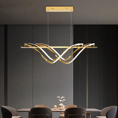 Contemporary gold hanging light illuminating an elegant living space